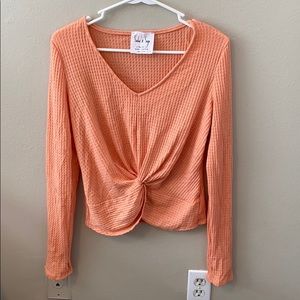 orange peach long sleeve top